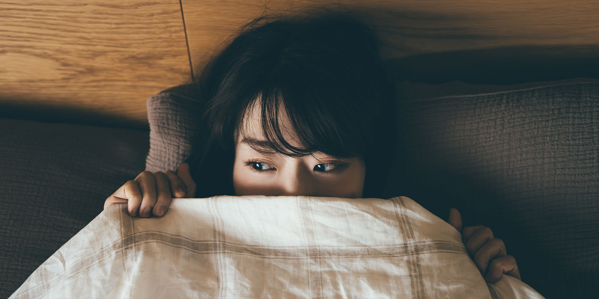 眠れない女性