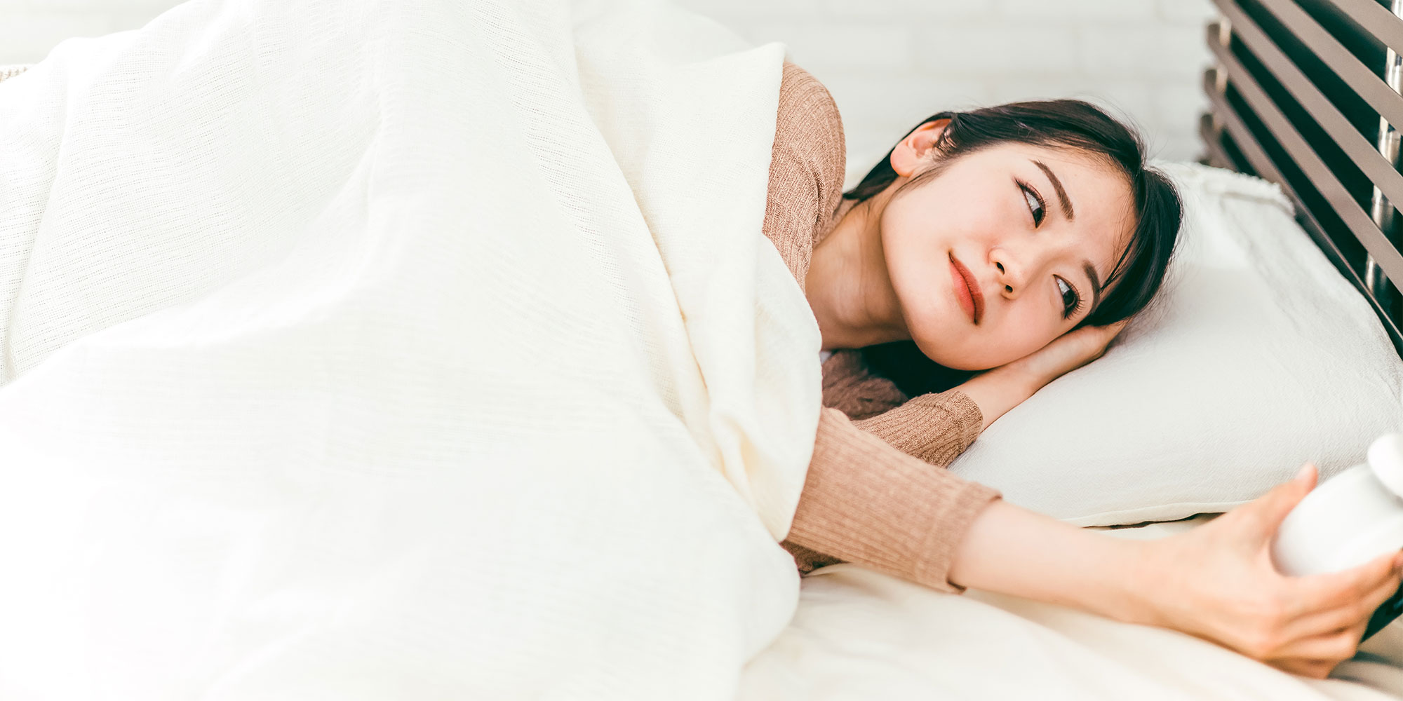 眠い女性